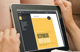 close up of a person's lap with a tablet